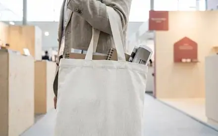 Printed cotton tote bag at a trade fair